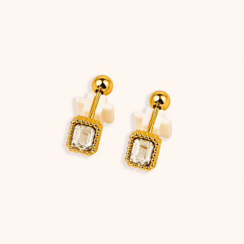 18k gold plated ivory luxe cartilage earrings with a clear gemstone.