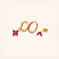 18K Gold plated set of 3 earrings set with pink gemstones on a white background by the Wish Store.