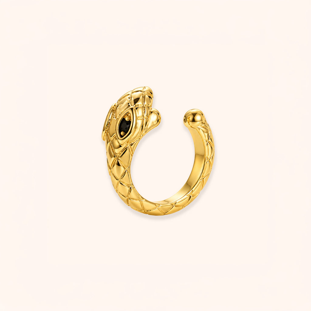 18K Gold Plated snake-shaped ear cuff with no piercing needed on a light beige background by The Wish Store