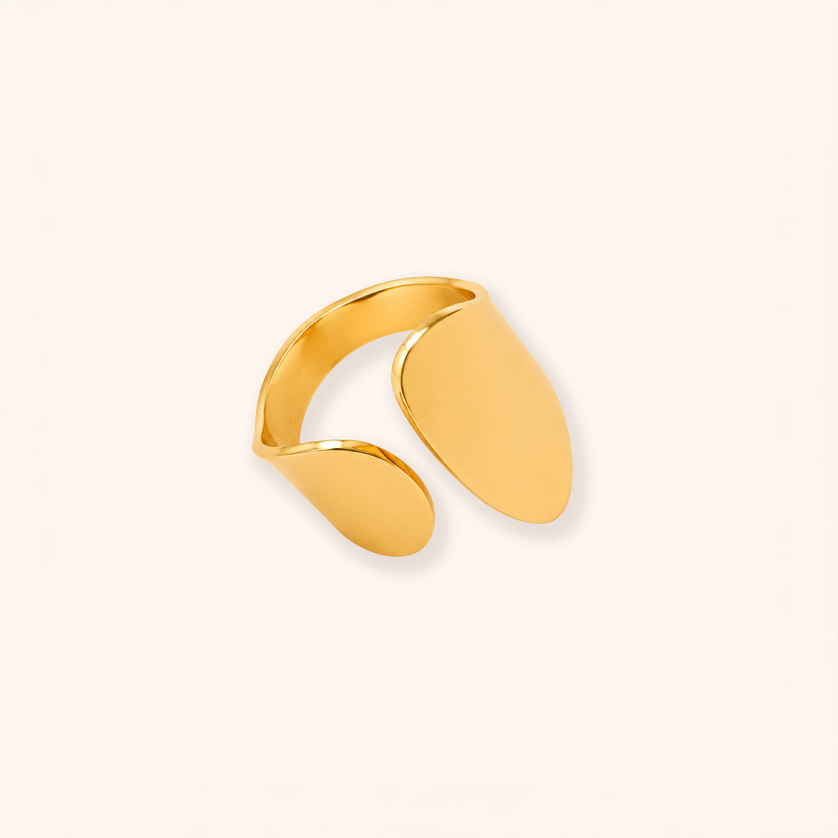 A minimalist 18K gold-toned open ring band with a smooth, polished finish, displayed on a clean, solid off-white background.