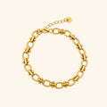 Waterproof 18k gold plated orbit link chain bracelet on a neutral beige background